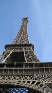 looking up at the eiffel tower